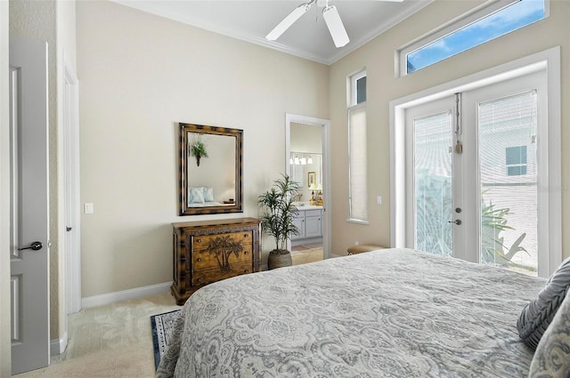 bedroom with light carpet, crown molding, access to outside, ceiling fan, and ensuite bathroom