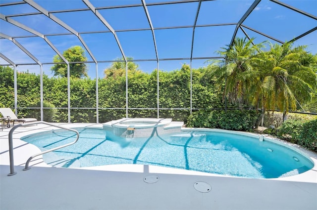 view of pool featuring an in ground hot tub and a lanai