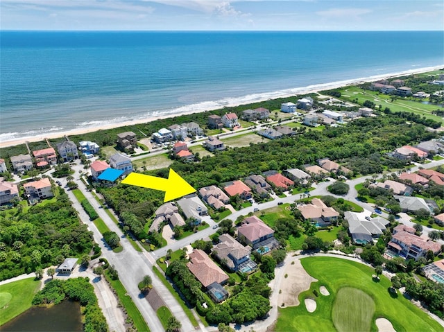 bird's eye view featuring a view of the beach and a water view