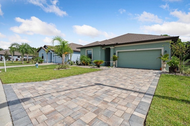 ranch-style home with a garage and a front lawn