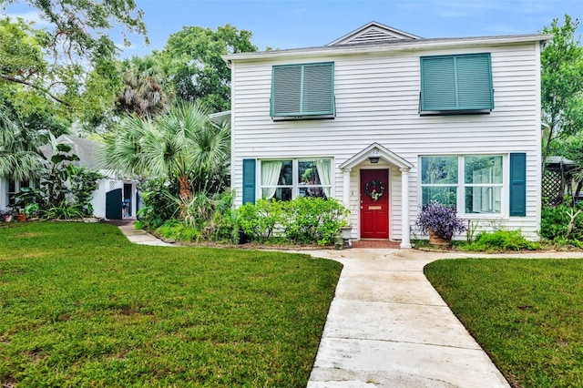 view of front of home with a front lawn