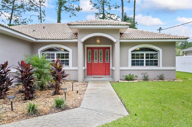 view of front of property with a front lawn