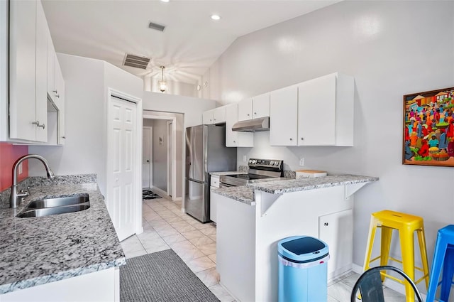 kitchen featuring light tile patterned floors, stainless steel appliances, sink, white cabinetry, and light stone counters