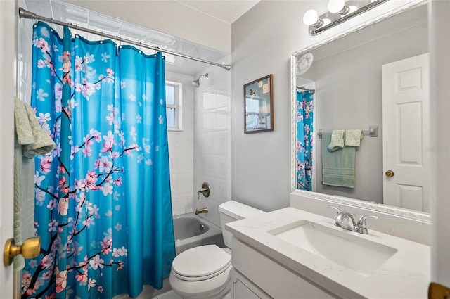 full bathroom with vanity, toilet, and shower / tub combo with curtain