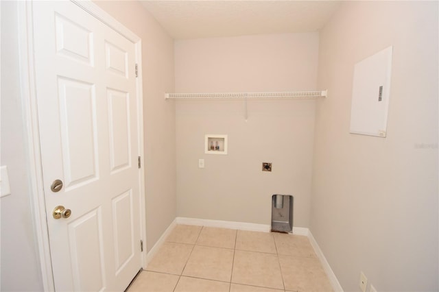 laundry area with hookup for a washing machine, electric dryer hookup, and light tile patterned flooring