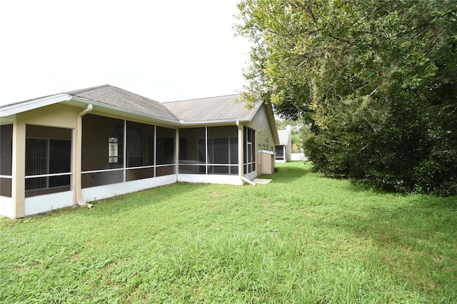 view of yard featuring a sunroom