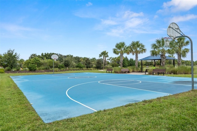 view of basketball court with a gazebo and a yard