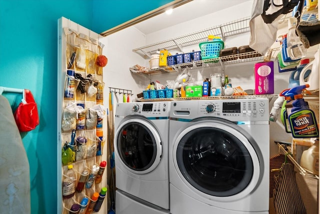 laundry room featuring washer and clothes dryer