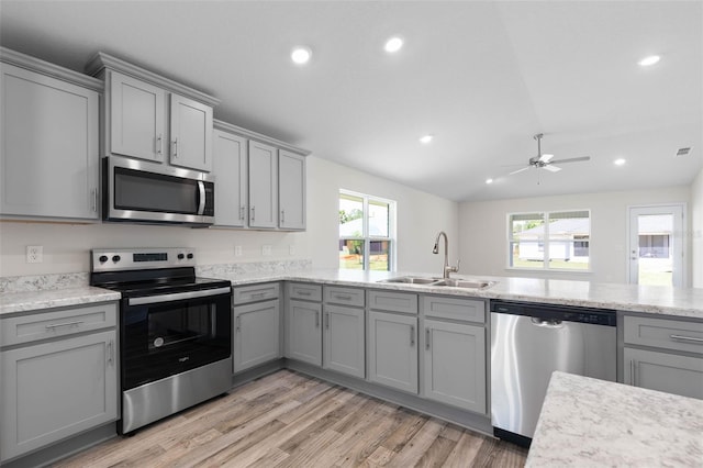 17 Service Berry Pl, Palm Coast, FL 32164 - kitchen featuring stainless steel appliances, gray cabinets, a ceiling fan, and recessed lighting