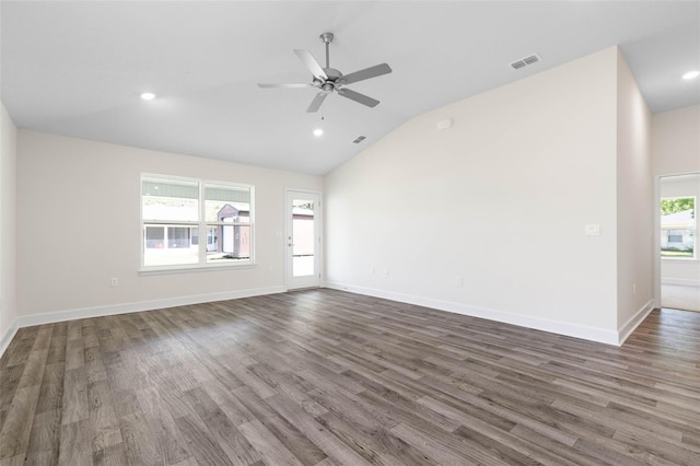 17 Service Berry Pl, Palm Coast, FL 32164 - empty room featuring lofted ceiling, wood finished floors, a ceiling fan, and recessed lighting