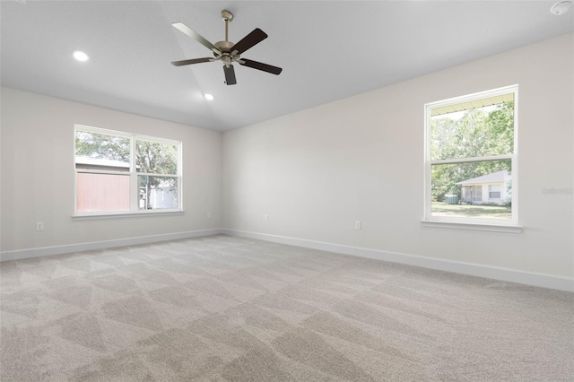 17 Service Berry Pl, Palm Coast, FL 32164 - spare room featuring lofted ceiling, light carpet, a ceiling fan, and recessed lighting