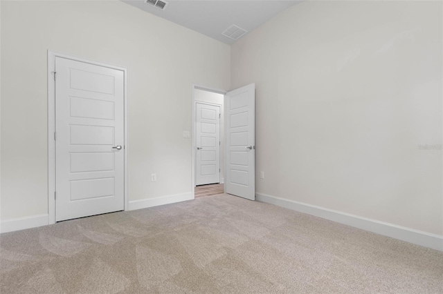 17 Service Berry Pl, Palm Coast, FL 32164 - unfurnished bedroom featuring carpet floors and baseboards