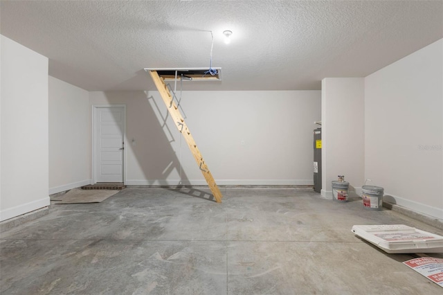 17 Service Berry Pl, Palm Coast, FL 32164 - garage with electric water heater and baseboards