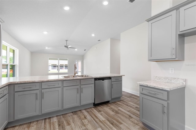 17 Service Berry Pl, Palm Coast, FL 32164 - kitchen featuring gray cabinets, stainless steel dishwasher, healthy amount of natural light, recessed lighting, and lofted ceiling