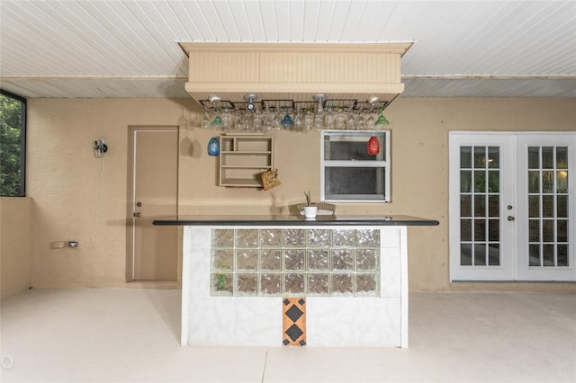 bar featuring french doors