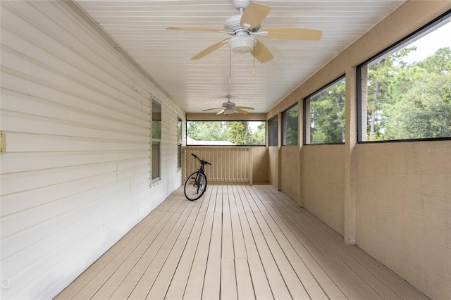 wooden terrace with ceiling fan