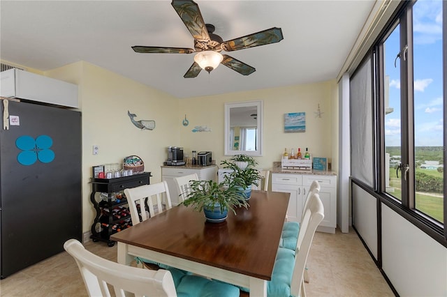 dining area with ceiling fan