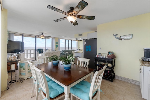 dining area featuring ceiling fan