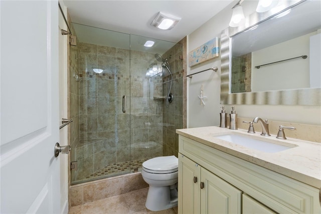 bathroom with an enclosed shower, tile patterned flooring, toilet, and vanity