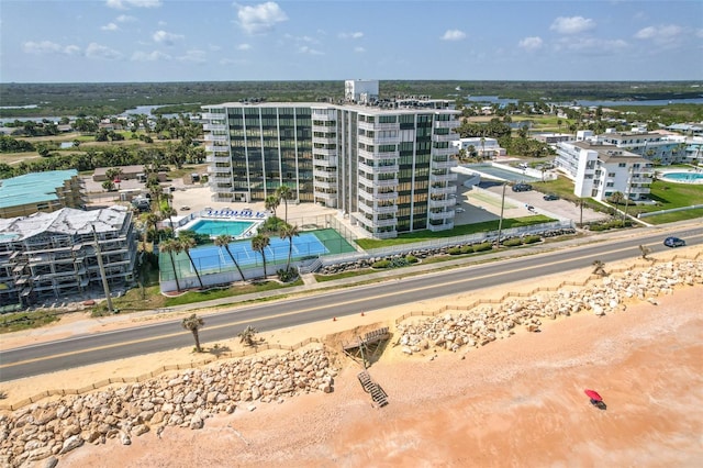 bird's eye view with a view of the beach and a water view