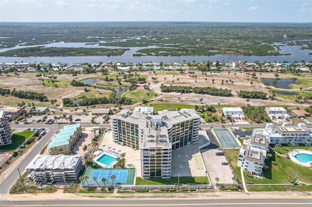 bird's eye view with a water view