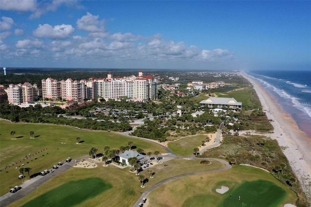 drone / aerial view featuring a view of the beach and a water view