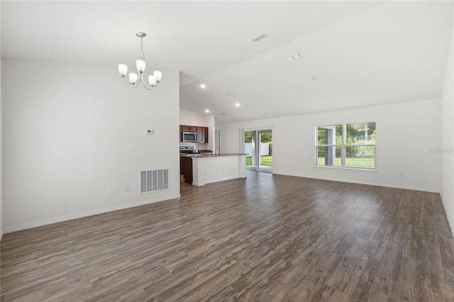 unfurnished living room featuring a notable chandelier, lofted ceiling, and dark hardwood / wood-style floors