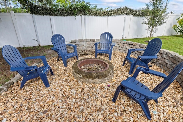 view of patio with an outdoor fire pit