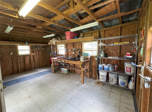 garage with a workshop area