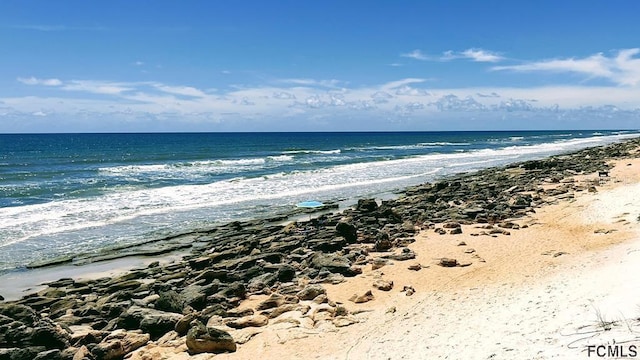 property view of water with a beach view