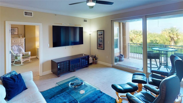 living room featuring ornamental molding and ceiling fan