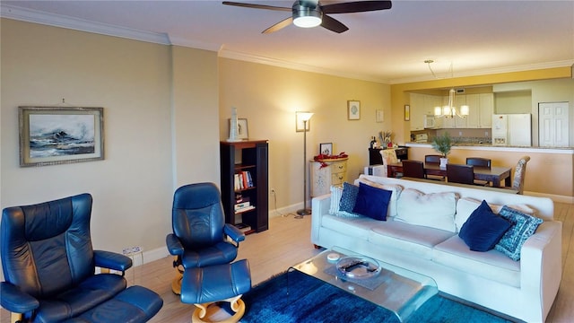 living room featuring ceiling fan with notable chandelier, crown molding, and light hardwood / wood-style floors