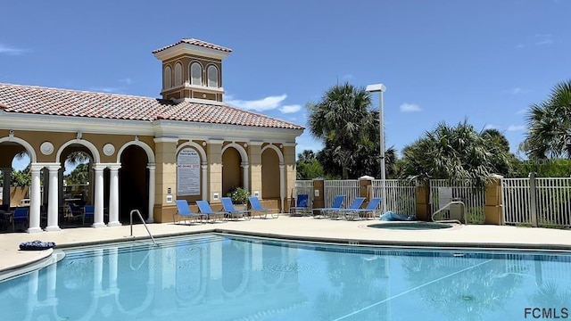 view of swimming pool with a patio