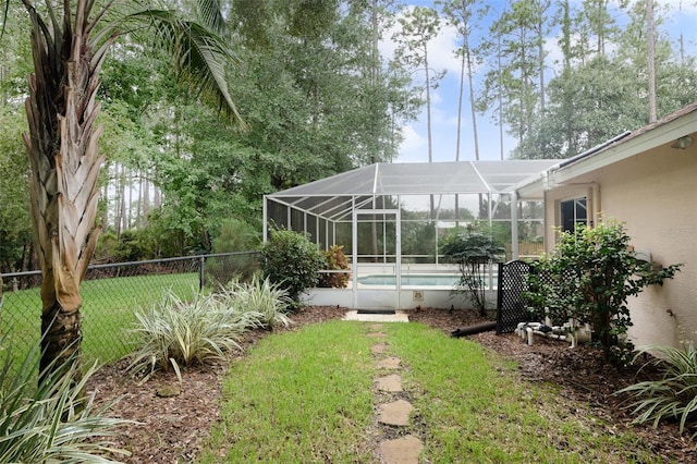 view of yard with a lanai