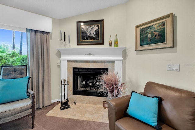 living area featuring light colored carpet, a fireplace, and vaulted ceiling