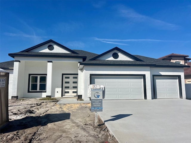 view of front of home with a garage