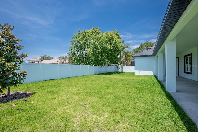 72 Flemingwood Ln, Palm Coast, FL 32137 - view of yard with a patio area
