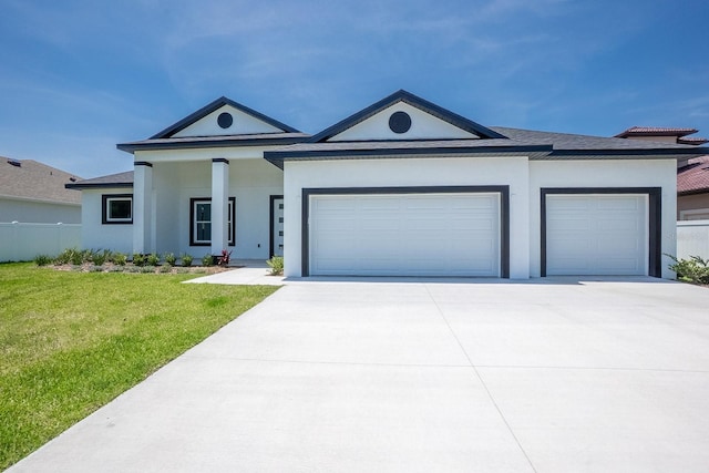 72 Flemingwood Ln, Palm Coast, FL 32137 - view of front of property with a garage, concrete driveway, a front yard, and stucco siding