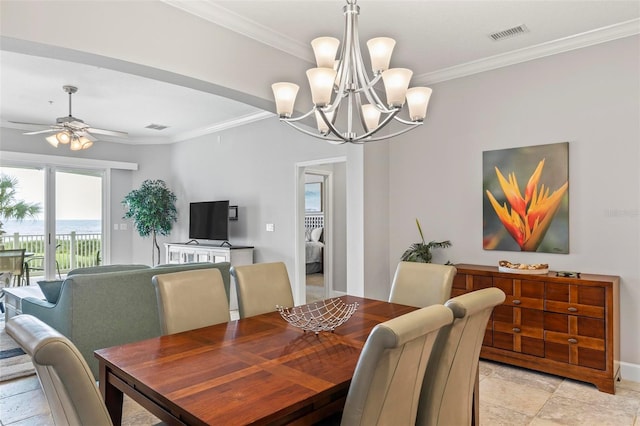 dining area featuring ceiling fan with notable chandelier and ornamental molding