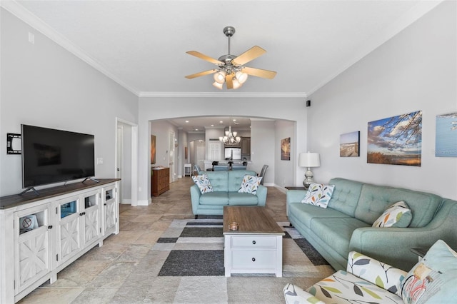 living room featuring ceiling fan with notable chandelier and ornamental molding