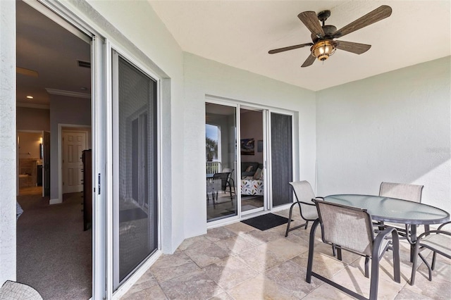 exterior space with ceiling fan