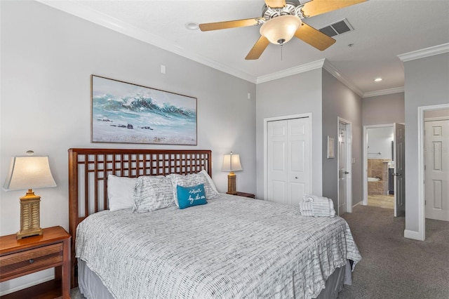 carpeted bedroom with ceiling fan, a closet, ensuite bath, and ornamental molding