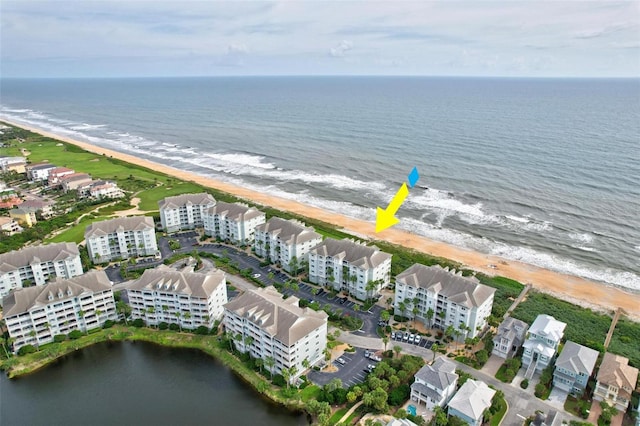 aerial view featuring a beach view and a water view