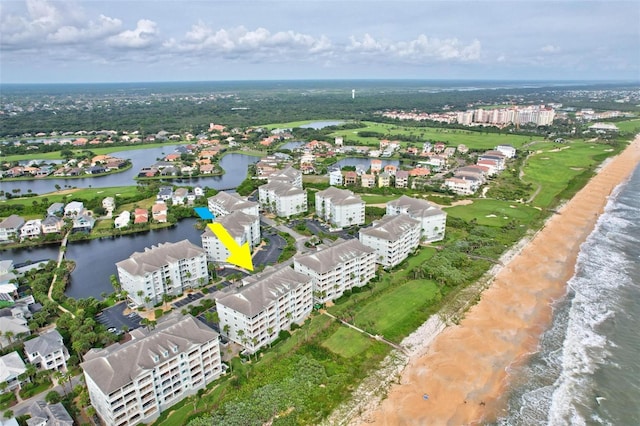 aerial view featuring a water view and a view of the beach