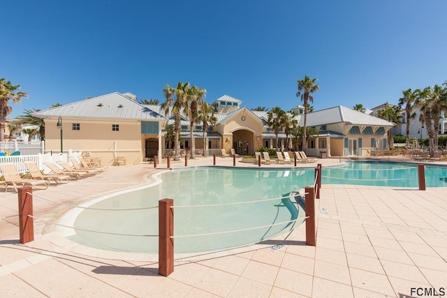 view of swimming pool with a patio area