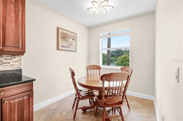 dining room featuring light tile patterned floors