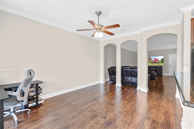 home office featuring ceiling fan, crown molding, and dark wood-type flooring