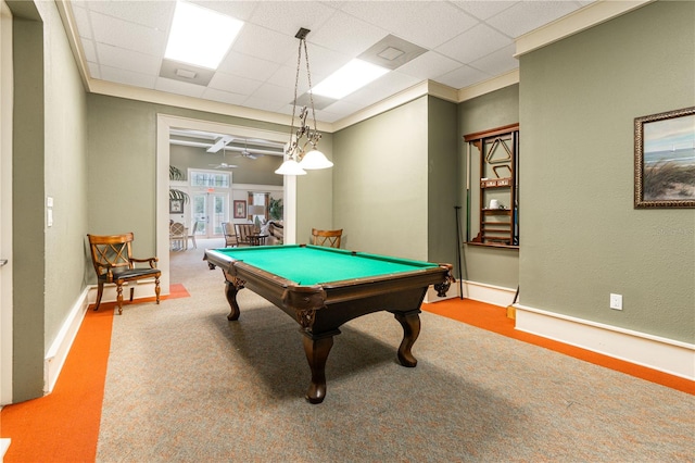 rec room with crown molding, carpet flooring, ceiling fan, pool table, and a paneled ceiling