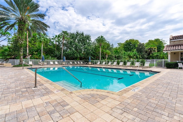 view of pool featuring a patio area