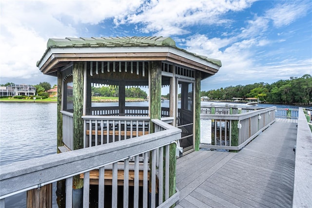 view of dock with a water view